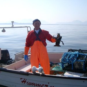 Besuch auf offener See von einem Hummerfischer.